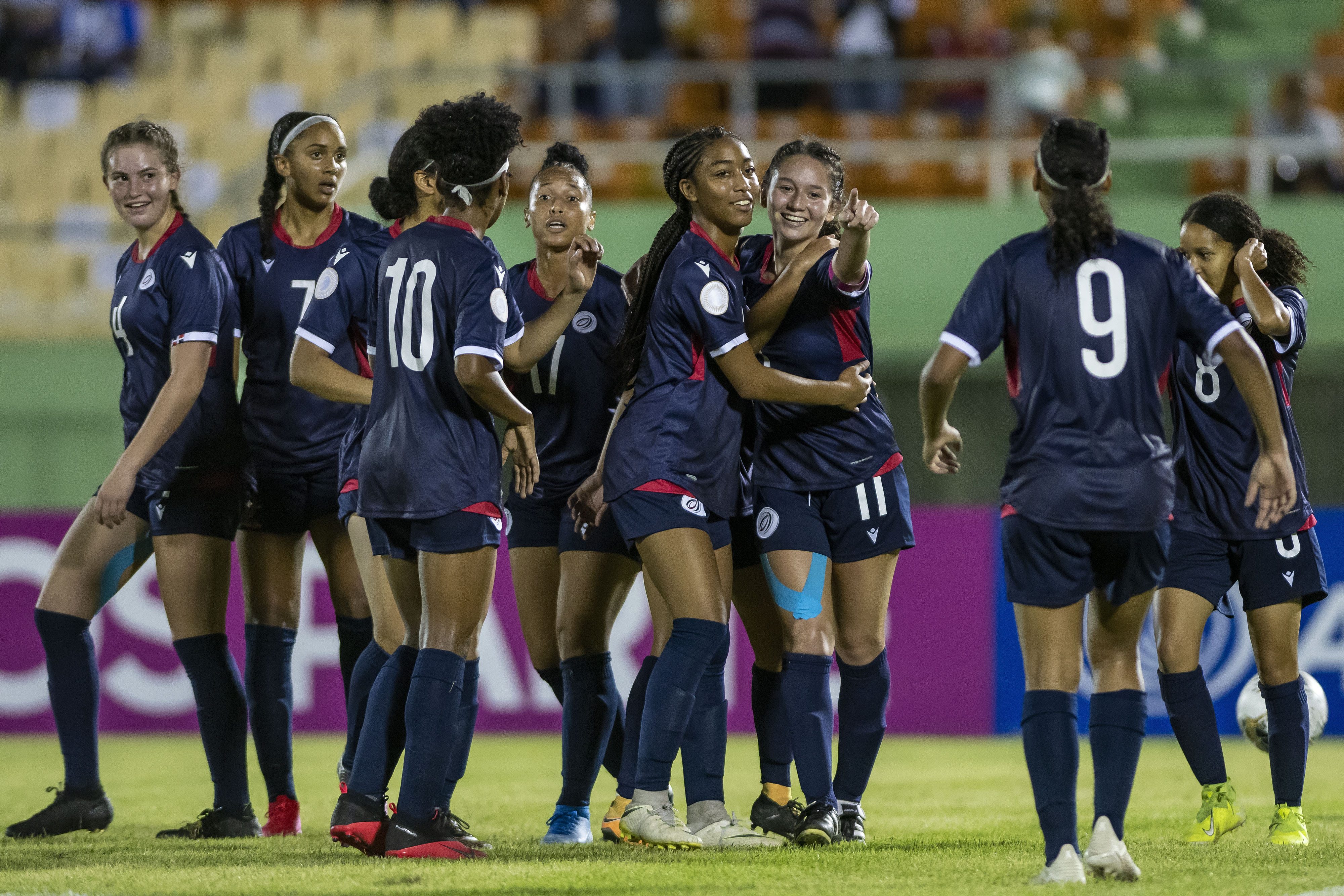 Soccer players on field during match