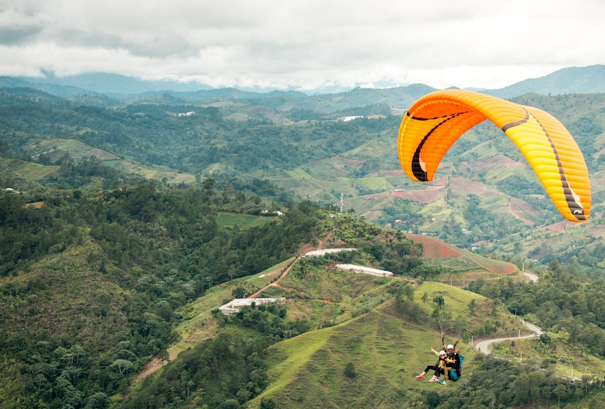 Beautiful landscape of Jarabacoa with lush green mountains and a river